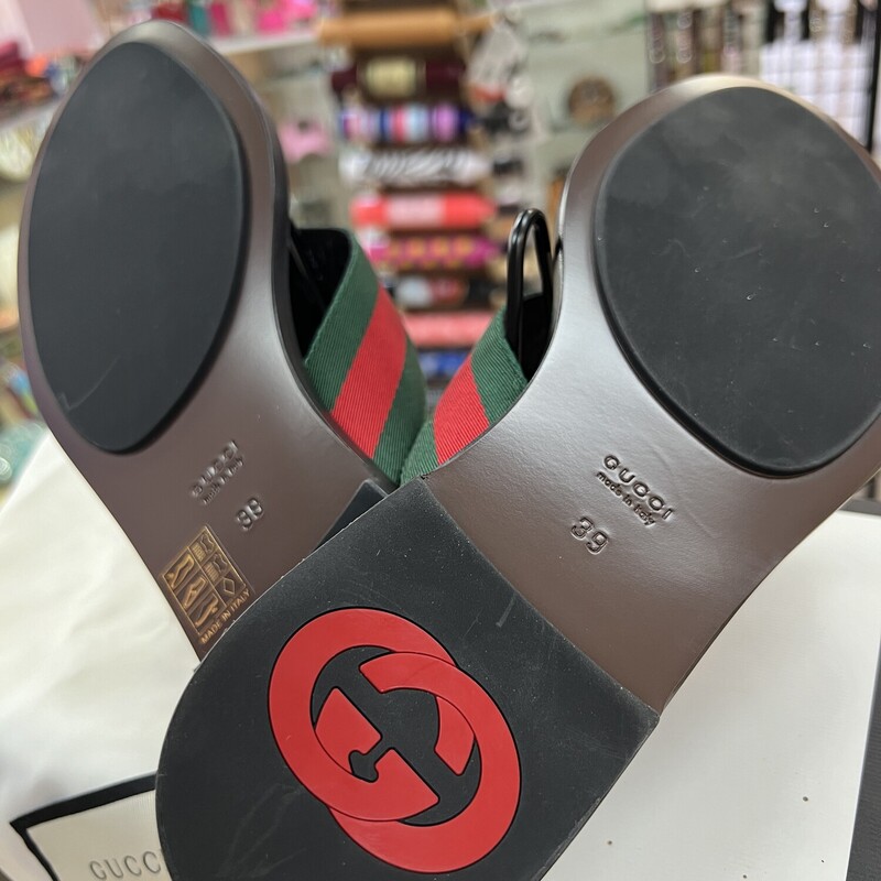 GUCCI<br />
GG THONG WEB SANDAL<br />
Bringing several House elements together, the thong sandal combines green and red Web straps with a GG patterned sole and Interlocking G hardware in a modern mix of silver- and gold-toned metals.<br />
<br />
Green and red nylon Web with black leather trim<br />
Gold- and silver-toned hardware<br />
Interlocking G<br />
Leather sole with GG pattern<br />
Square toe<br />
Flat<br />
.2\" height<br />
Made in Italy<br />
Comes with Original GUCCI box & Shoe Bags<br />
Retails: 595.00<br />
These Sandals are in like NEW condition