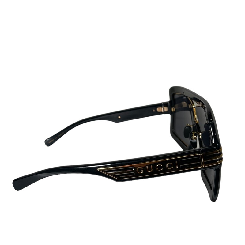 Gucci GG0900S, BLack
Oversize sunglasses with gold metal Web detail on the frames and a mirror lens with GG motif gives a subtle nod to the House’s heritage. The Epilogue collection puts an emphasis on leaving fashion's old rules behind, it conveys the idea that pieces should be timeless–not just in fashion for one season.

Black acetate frame with gold metal Web detail
Black acetate temples
Multilayered grey and bronze mirror lens with GG motif
100% UVA/UVB protection
GG0900S
Temple length: 5.3, lens height: 2.1, nose bridge length: .4
Frame height: 2.7, frame width: 5.8
Made in Italy