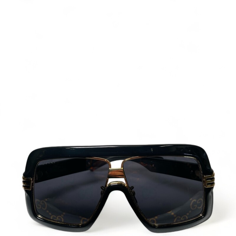 Gucci GG0900S, BLack
Oversize sunglasses with gold metal Web detail on the frames and a mirror lens with GG motif gives a subtle nod to the House’s heritage. The Epilogue collection puts an emphasis on leaving fashion's old rules behind, it conveys the idea that pieces should be timeless–not just in fashion for one season.

Black acetate frame with gold metal Web detail
Black acetate temples
Multilayered grey and bronze mirror lens with GG motif
100% UVA/UVB protection
GG0900S
Temple length: 5.3, lens height: 2.1, nose bridge length: .4
Frame height: 2.7, frame width: 5.8
Made in Italy