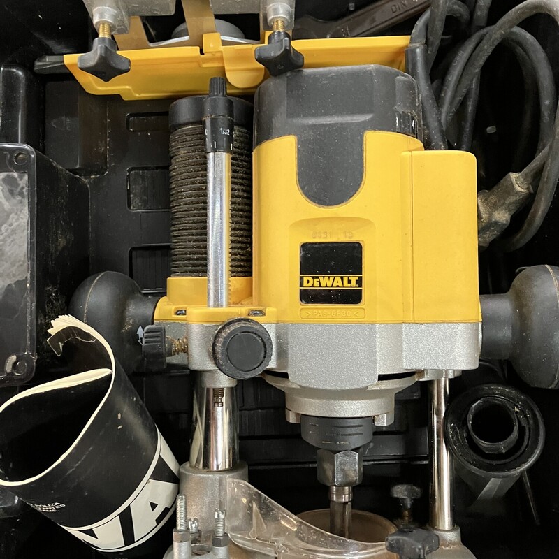 Plunge Router, DeWalt 2HP

The DEWALT DW621 router features a full wave electronic variable speed motor with soft start. This router's 8,000-24,000 rpm motor is designed for constant speed under load to ensure a quality finish in all materials. A rack and pinion depth adjuster, with micro-fine adjusting allows quick, accurate set-up of this router. Phosphorous bronze bushings provide a smooth and accurate plunge every time. Also includes 1/4 in. collet, 1/2 in. collet, template guide bushing adapter, and wrench.

Highlights
Integral dust collection system efficiently removes chips and provides superior bit visibility
Spindle lock button allows for single-wrench bit changes
Innovative rubber-coated knobs have plunge-lock and on/off built-in for maximum user control
1/4 in. or 1/2 in. collet capacity for greater versatility
10 Amp motor uses state of the art circuitry for soft starts and smooth operation
One-piece motor shaft and spindle ensures perpendicularity and accuracy
Guide Bushing adapter plate accepts standard guide bushings for template work
Micro-fine depth adjusts in increments of 1/256 in. for extreme accuracy
Phosphorous bronze bushings provide a smooth and accurate plunge