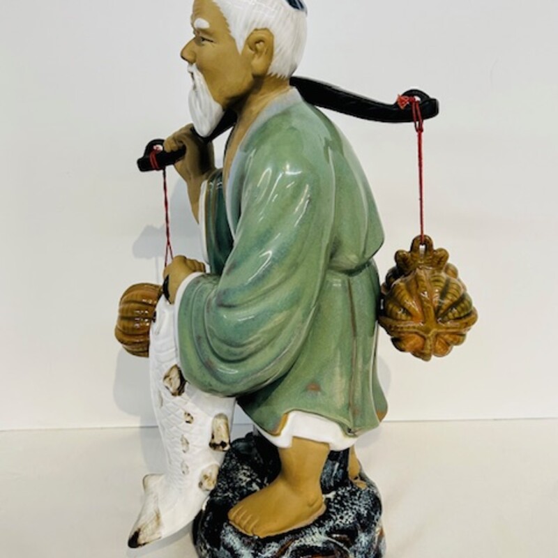Ceramic Wan Jiang Asian Man Carrying Fish
Blue Gray Green White Tan Size: 7 x 14.5H
Coordinating woman statue sold separately