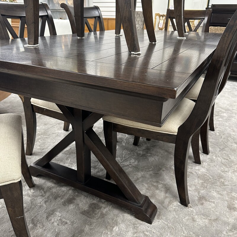 Dining Table + 8 Chairs (6 side chairs and 2 arm chairs), plus one 20in leaf. Sold as a set.
Size: 76x40x30