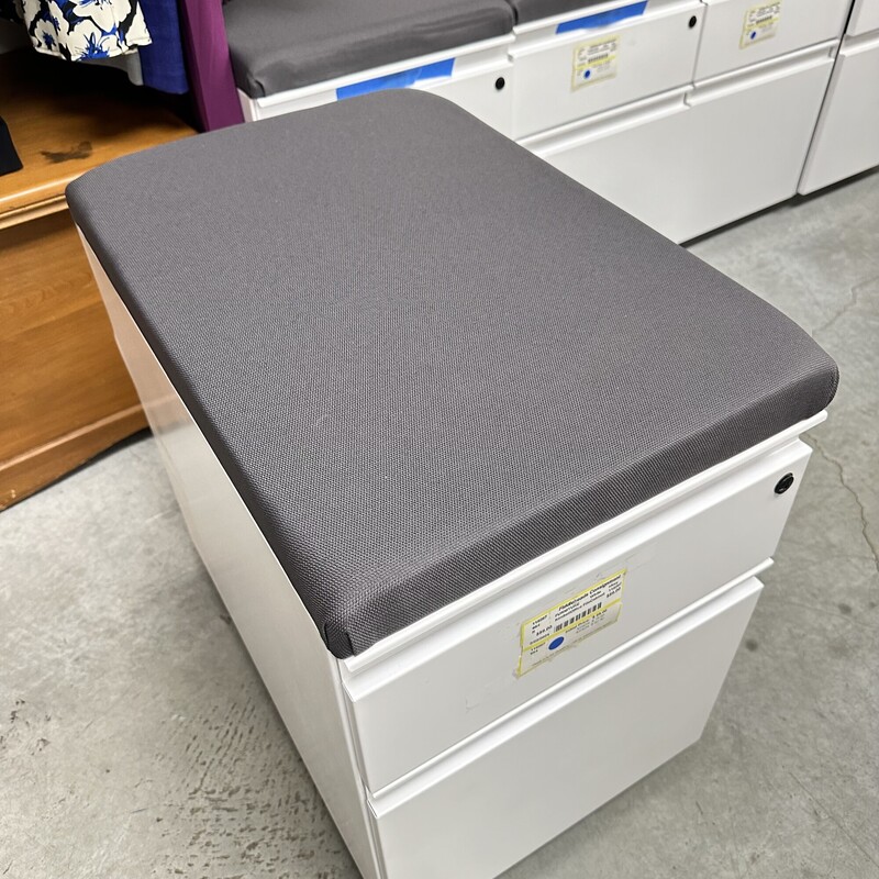 Kimbell Office Filing Cabinet on Wheels, White Metal with Gray Upholstered top. New and Never Used! Has a Key for Locking.
Size: 15L x 23D x 23H