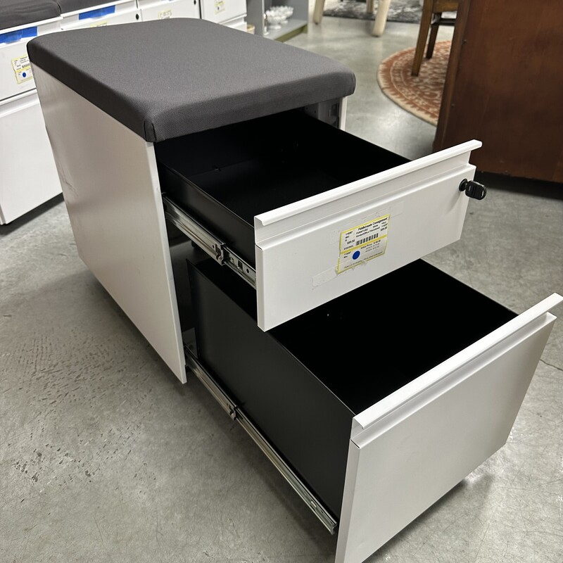 Kimbell Office Filing Cabinet on Wheels, White Metal with Gray Upholstered top. New and Never Used! Has a Key for Locking.
Size: 15L x 23D x 23H
