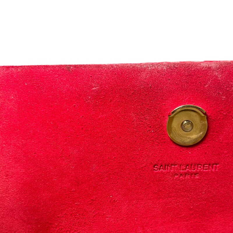 YSL So Kate Tassel Crossbody<br />
This Kate crossbody bag from Saint Laurent is designed using red leather with a gold-toned YSL accent and tassel motif attached to the front. This bag is finished with a sturdy chain strap and a suede-lined interior.<br />
Dimensions: 7x4 strap drop 21<br />
Code: 326076-496395