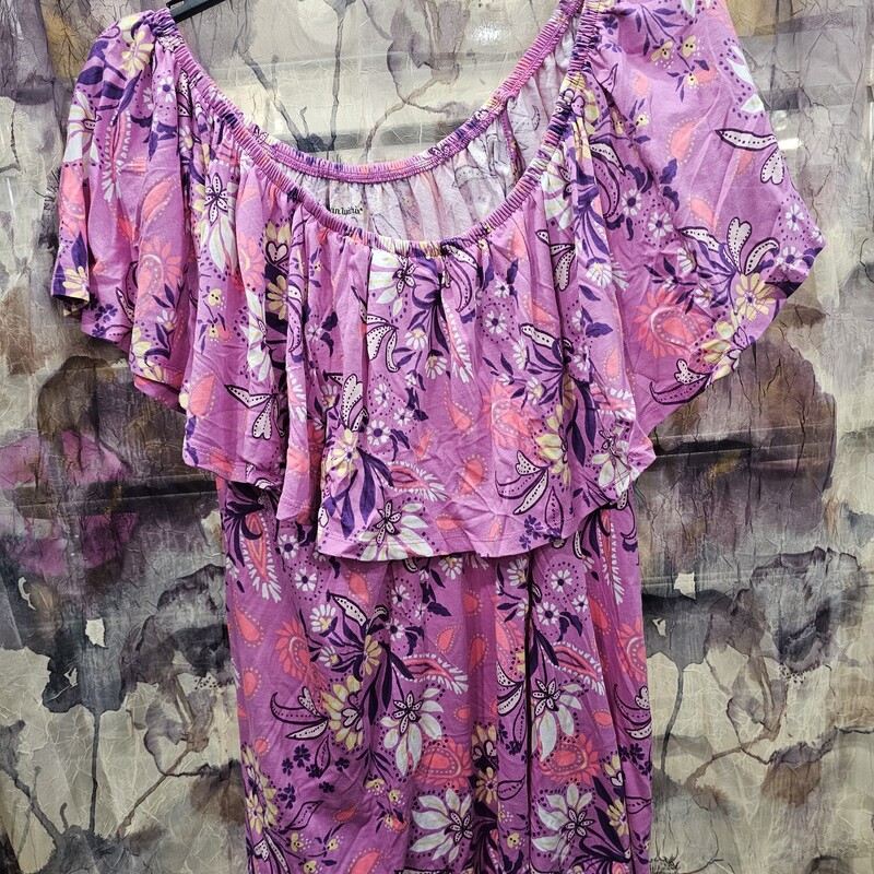 Super cute summer top with sleeveless style but an overlaying ruffle to cover the upper arms. Purple with floral print.