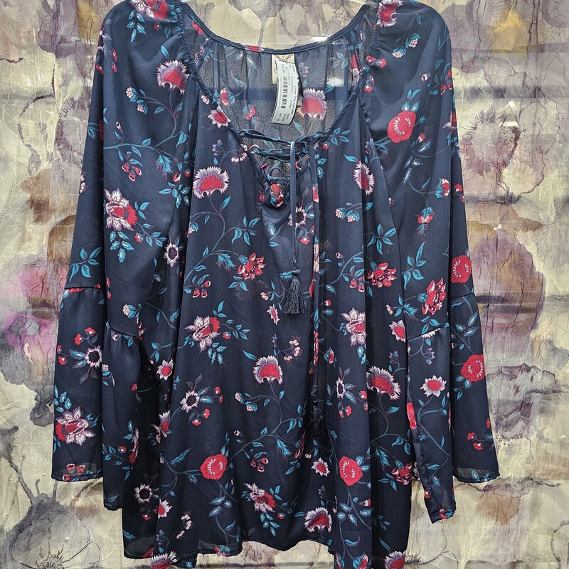 Beautiful blouse in navy blue with red floral design.