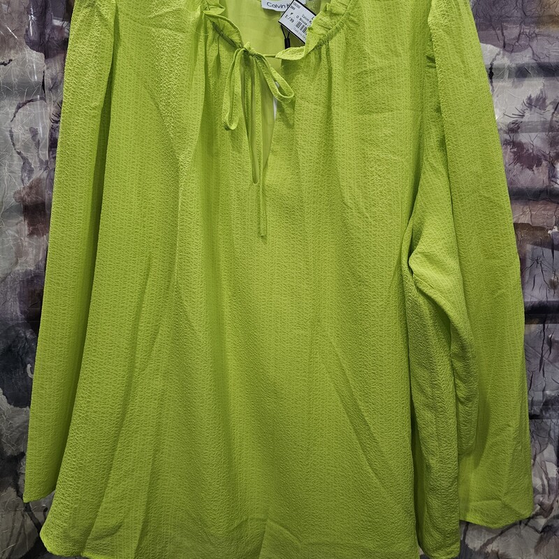 Brand new with tags and retails for $89. Long sleeve lime green blouse with ruffled collar.
