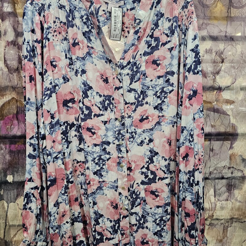 Brand new with tags, this button up blouse is low profile collar and white with blue and pink floral print and long sleeves.