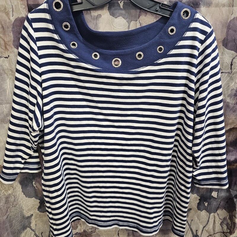 Half sleeve knit top in a navy and white stripe with rivets and rhinestones