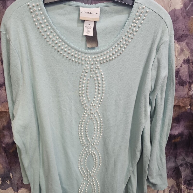 Three quarter sleeve mint green knit top with beautiful pearl beading.
