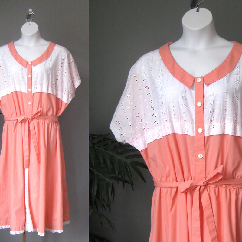 Shirt dress from the 1960s in a peach cotton poly blend.
The top has short sleeves and a white eyelet inset detail.
The waist is elasticized
The skirt is quite full and has another eyelet inset.
Pretty summery peach color.
Unlined
Buttons to the waist.
Sash belt
by Bridge Gate
made in Taiwan

This dress could fit a modern size 3X, pls use thhe measurements provided as your ultimate guide to fit.
Flat measurements:
armpit to armpit: aprox 44
Waist: 20.5 stretches comfortabley to 24
Hip: 29
Length: 47

Excellent condition.

Thanks for looking!
#3784