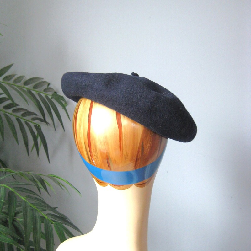 Darling vintage navy blue wool beret
these look so chic perched on your head and it is easy to style in different ways by changing the position on the head
This one is 100% wool, made and sold in Madrid Spain.
It has a leather interior hat band which is cracked in multiple places but doesn't affect the wearing and the outside is in excellent condition.
It measures 21 around on the inside.


Thanks for looking!
 #50743