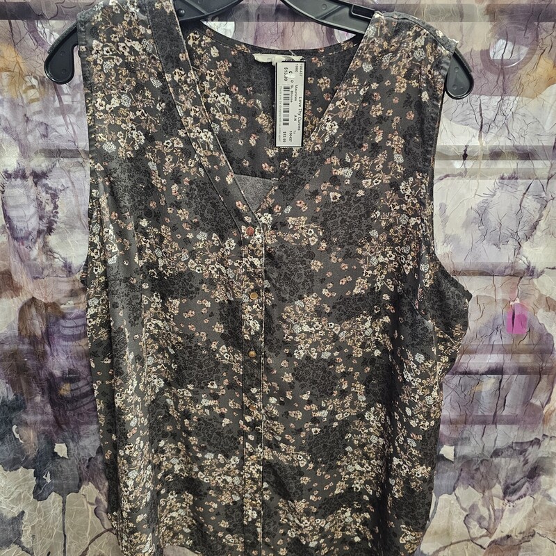 Sleeveless button up top in grey with brown floral print.