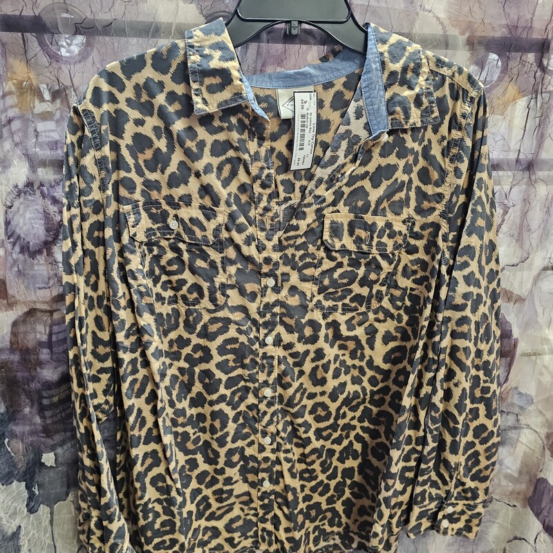 Button up front blouse in an animal print.