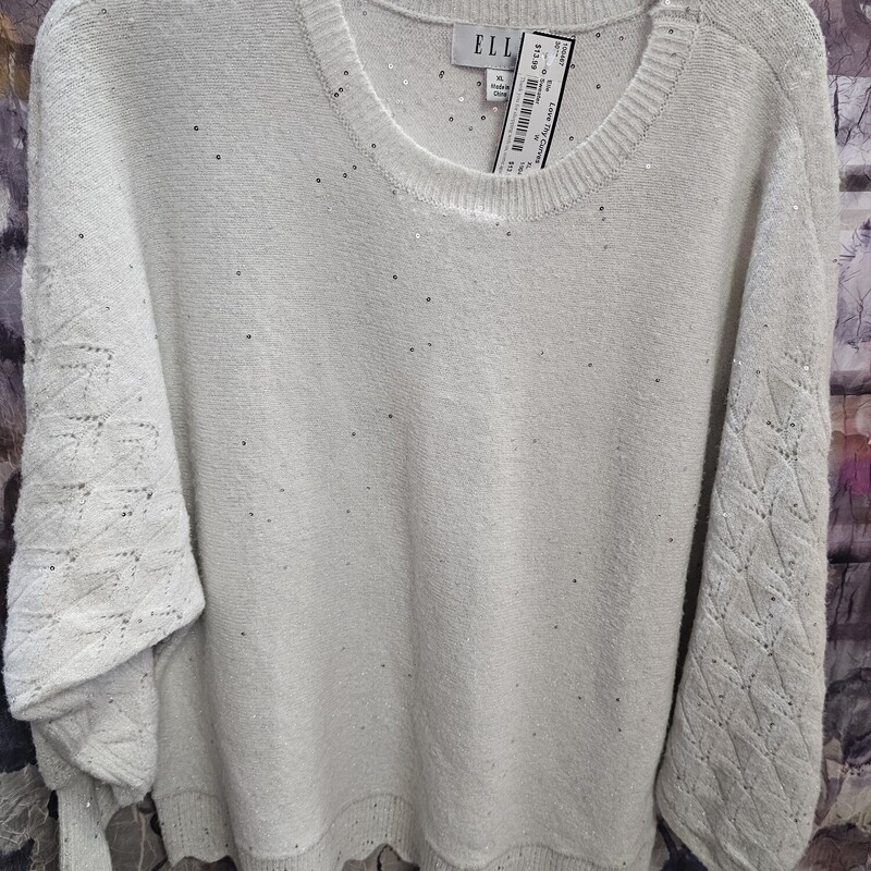 White sweater with long sleeves and silver sequins