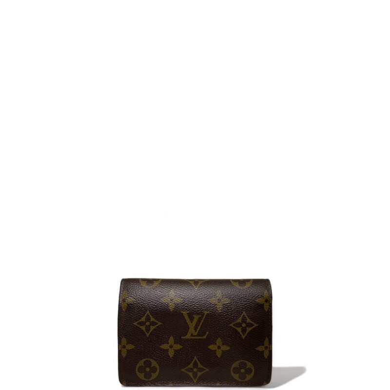 Louis Vuitton Juliette Rose<br />
<br />
Size: OS<br />
<br />
Dimensions:<br />
Base length: 5.25 in<br />
Height: 3.50 in<br />
Width: 1.00 in<br />
<br />
<br />
This is an authentic LOUIS VUITTON Monogram Juliette Wallet in Rose Ballerine. This stylish medium-sized wallet is crafted of Louis Vuitton monogram on toile canvas. The wallet features a polished gold LV logo snap closure on the facing flap that opens to a pink cross-grain leather interior with card slots, pockets, a billfold, and a zipper compartment.