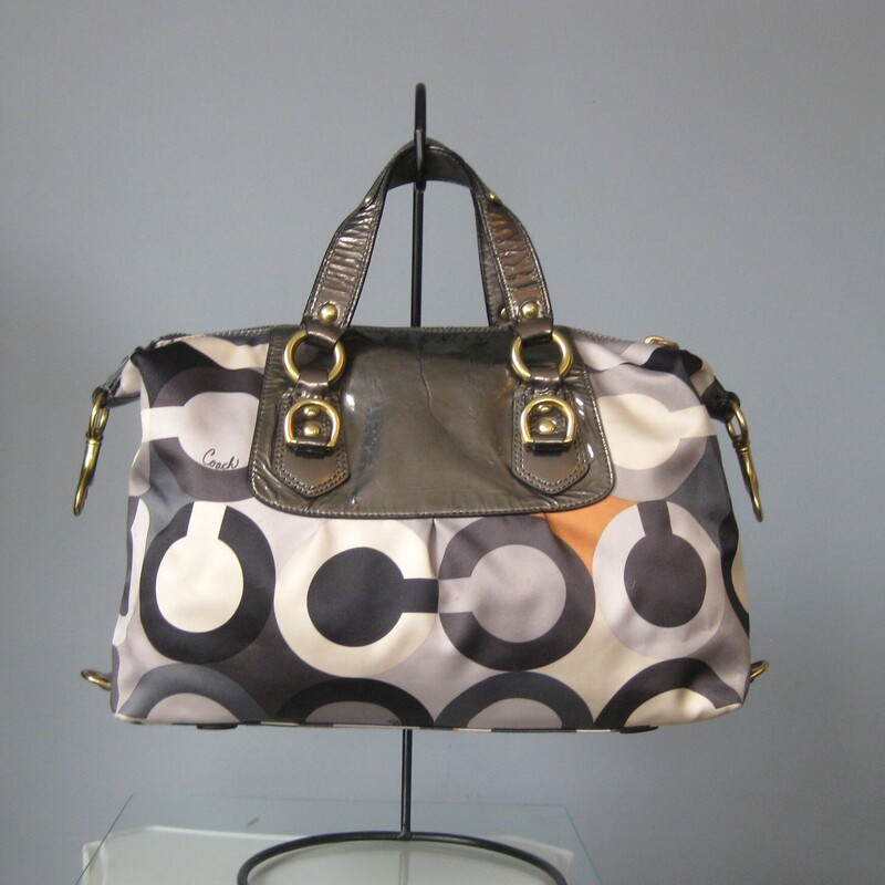 Coach 12932 Satin Satchel, Gray, Size: None<br />
Coach Satchel from Y2K era<br />
mettalic/sateen fabric and trim.<br />
Dark brown patent leather with brown, cream, orange logo fabric body<br />
one zip pocket inside and one slip.<br />
<br />
Great vintage condition.  Pre-owned but no worn!<br />
thanks for for looking!<br />
<br />
#69301