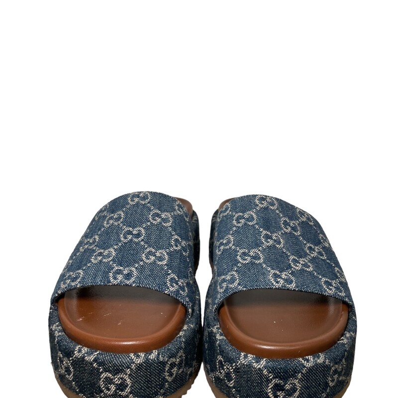 Gucci Angelina Platforms<br />
Denim GG Monogram Angelina Platform 55mm Slide Sandals in Blue Tea. These sandals are crafted of denim monogram canvas and feature a<br />
1.75-inch platform.
