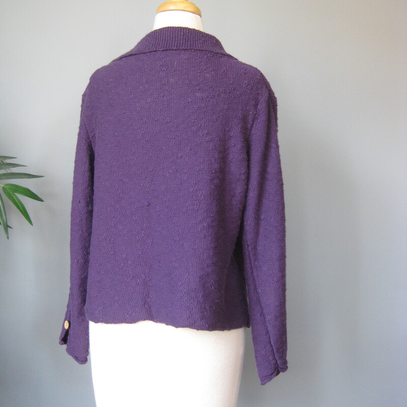 Habitat Chunky Wood Bttnd, Purple, Size: Small<br />
Chic relaxed 100% cotton pullover sweater by<br />
Habitat - clothes to live in.<br />
It's a beautiful dark teal color.<br />
The knit is drapey and knubby<br />
It's a pullover NOT a cardigan,  But it looks like a cardigan because of the decorative oval wood look buttons arranged off center down the front.<br />
The collar can be close with a loop over that top button, but the loop is a little stretched out.  Easy fit, I can take a crack at it for you if you wish.<br />
<br />
 Marked size M<br />
flat measurements:<br />
shoulder to shoulder; 17.75<br />
armpit to armpit: 20.25<br />
width at hem: 20<br />
length: 19<br />
underarm sleeve seam: 15, this may seem a little short, but the shoulder seam will sit a little low, a little outside the shoulder.<br />
<br />
Thanks for Looking!<br />
#64680