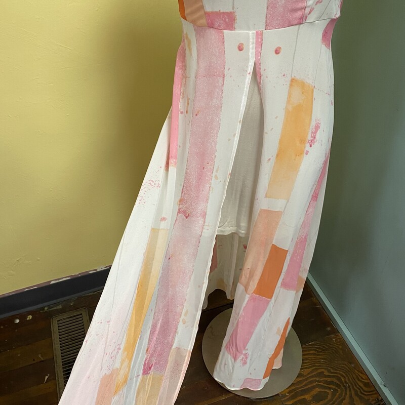 this dress is definitely a unique find!!!<br />
adjustable spaghetti straps<br />
zip up the back<br />
tshirt style mid length<br />
long flowy maxi strips<br />
great patterns<br />
<br />
Cato, Pink, Size: 4