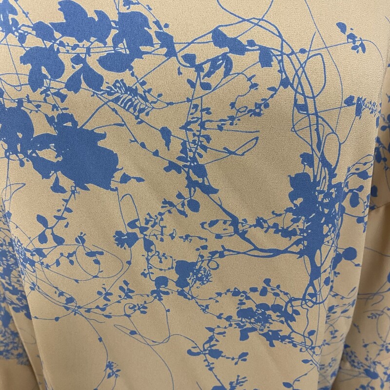 loving the print on this neutral top
gorgeous blue design throughout
open, billowy sleeves
loose flowy fit
ruffle sleeves
criss cross, slight v in the back
slight scoop neck

Vision USA, Tan, Size: L