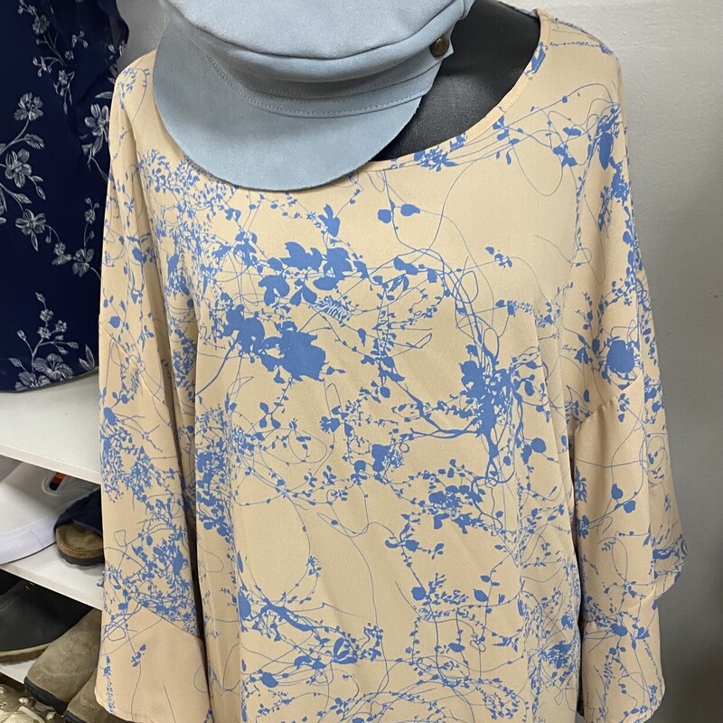 loving the print on this neutral top
gorgeous blue design throughout
open, billowy sleeves
loose flowy fit
ruffle sleeves
criss cross, slight v in the back
slight scoop neck

Vision USA, Tan, Size: L