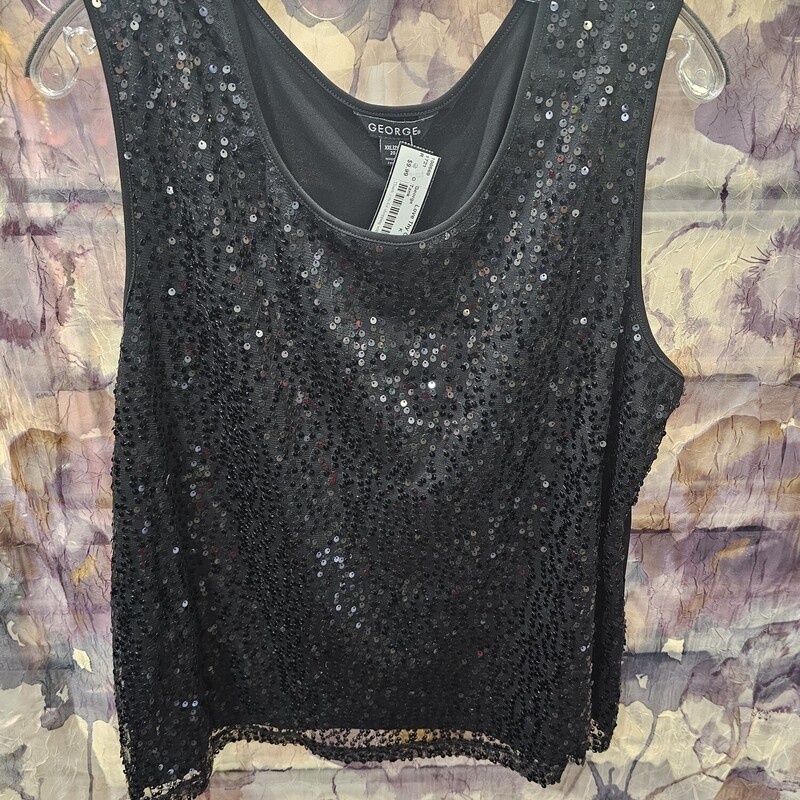 Black tank with sequins covering the front panel.