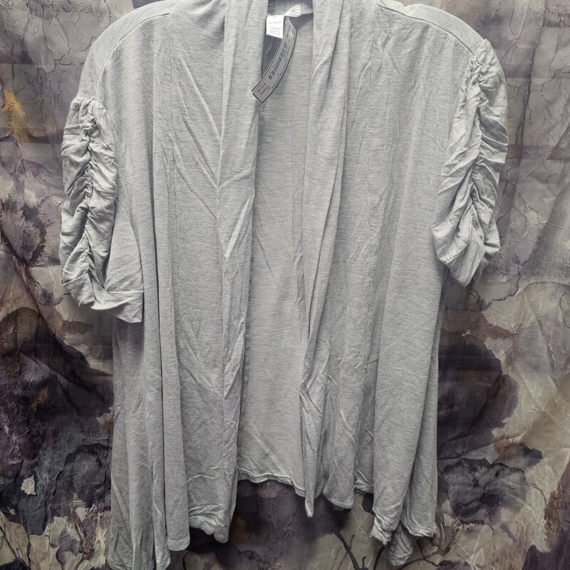 Short sleeve knit cardigan style top in grey with open front.
