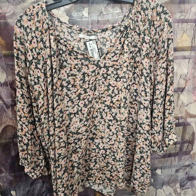 Half sleeve blouse with cute floral print.