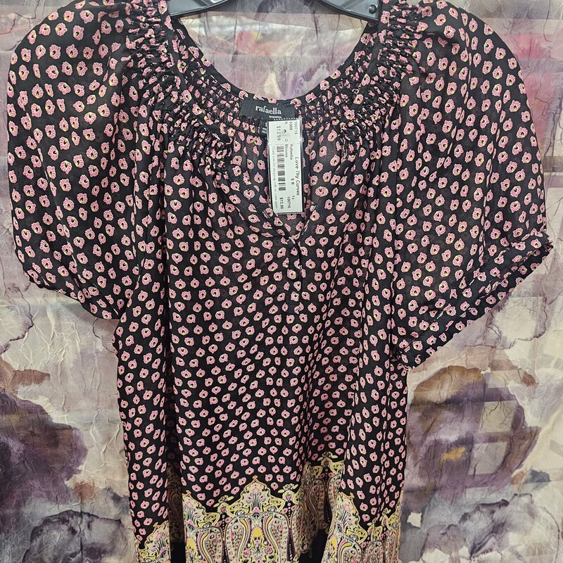 Cute short sleeve blouse in black with pink and beige design.
