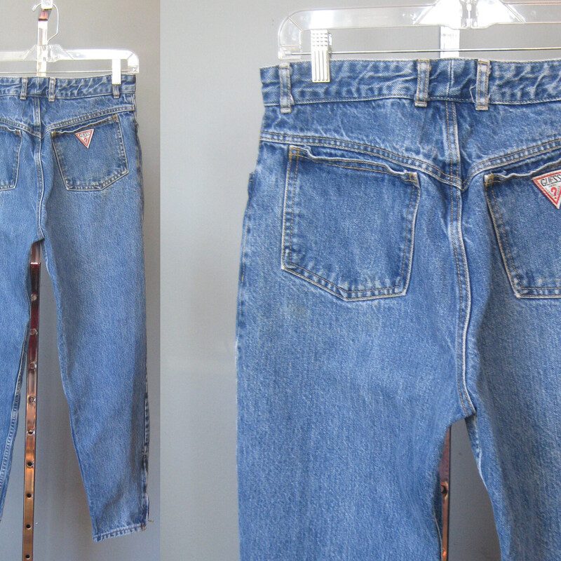 Vintage 1980s high waisted jeans by Georges Marciano for Guess<br />
Regular weight denim in a medium blue wash.  Tapered leg with zippers at the end<br />
High waisted<br />
made in the USA<br />
Marked size 8 but beware, may fit smaller, pls see measurements below<br />
Excellent condition.<br />
<br />
Flat measurements:<br />
waist: 15.25<br />
hip: 20.5<br />
rise: 13<br />
inseam: 27<br />
side seam: 37.5<br />
<br />
Thanks for looking!<br />
#70114