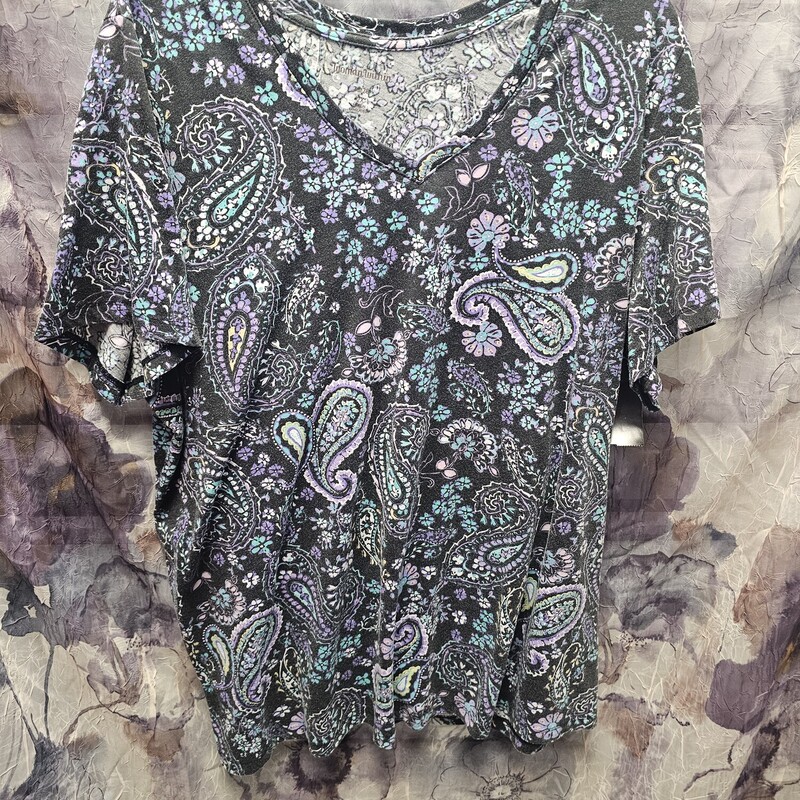 Half sleeve tunic style blouse in teal with black print.