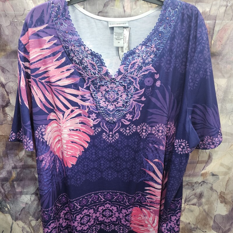 Short sleeve knit top in purple and pink with bling and lace neckline.