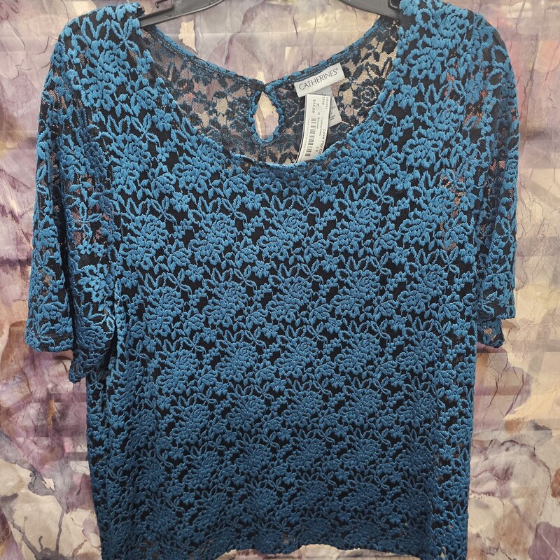 Beautiful double layered blouse with black solid under layer and a lace teal and black over layer
