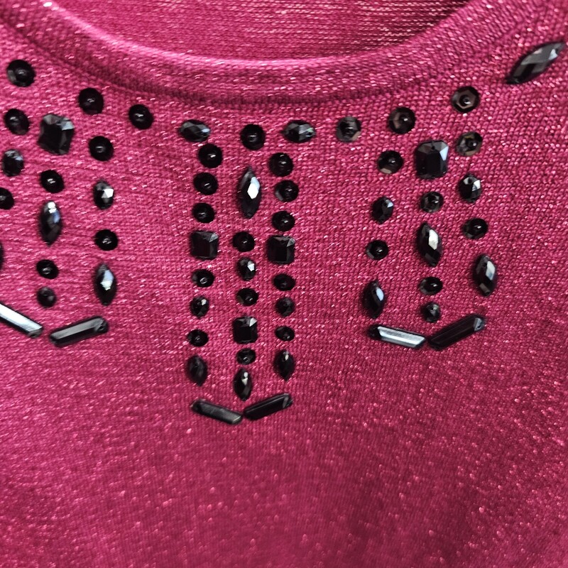 Beautiful twin set with tank and matching cardigan. Burgandy and shimmery with bead work. Can be worn as separates for year round use.