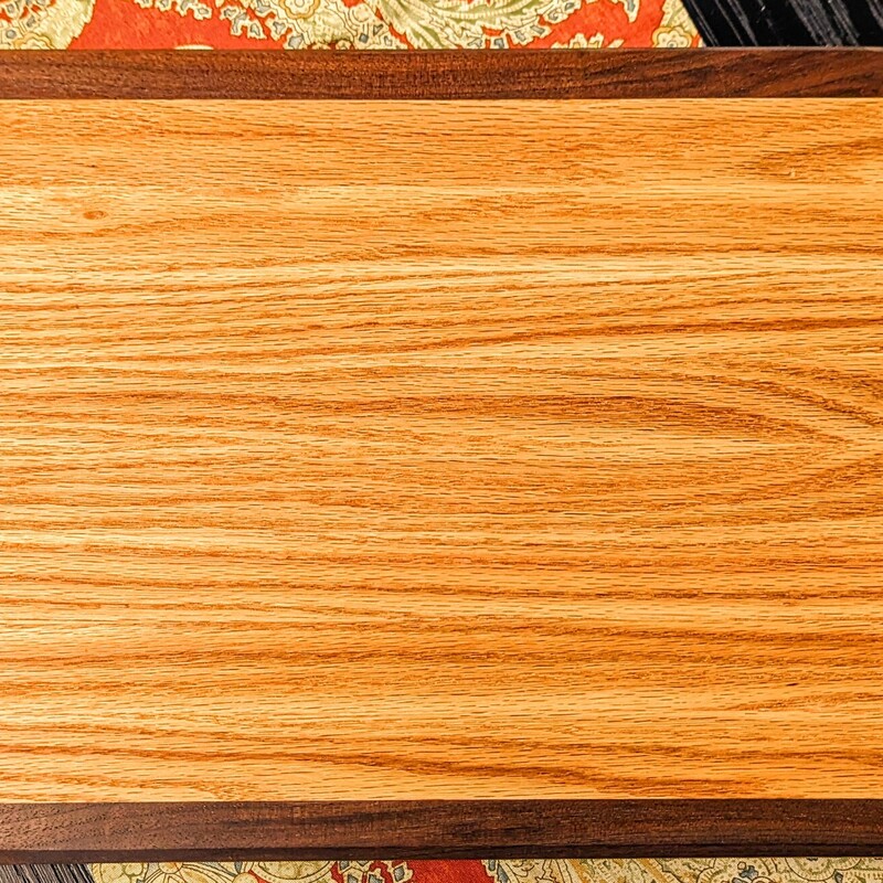 JLSmith Wood Cutting Board
Tan and Brown
Size: 18x2x12