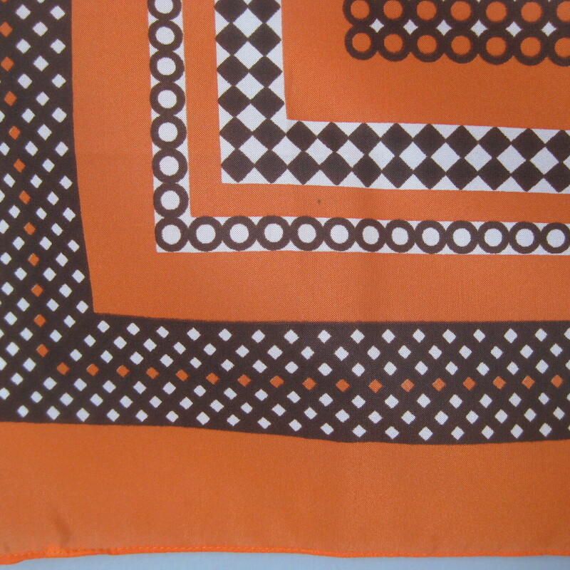 Simple little square bandana from the 1970s in orange and brown and white<br />
24 square<br />
Excellent condition.<br />
thanks for looking!<br />
#65692