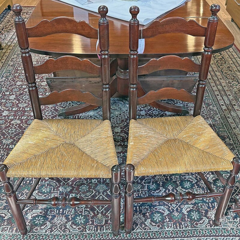 Pair of Mahogany Rush Seat Ladderback Chairs
19 In Wide x 15 In Deep x 38 In Tall.