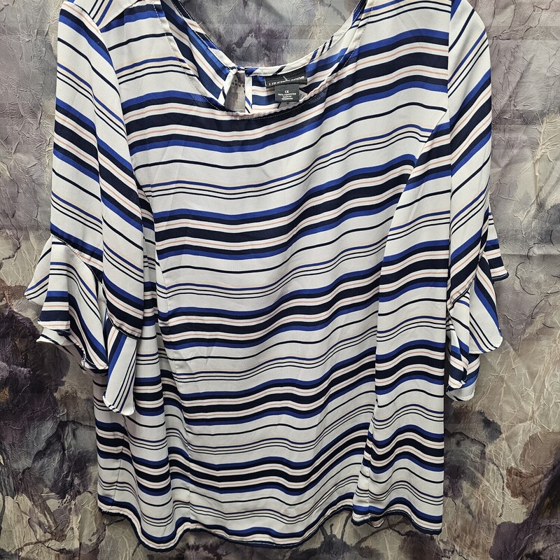 Short sleeve with ruffle blouse in a black white blue and gold stripe.