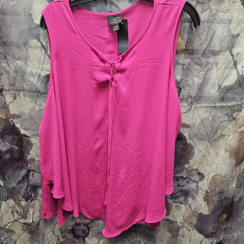 Hot pink never looked so good. Sleeveless tank style blouse