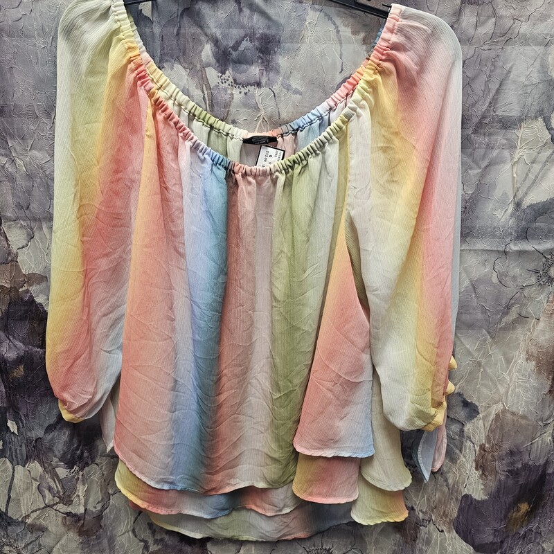 OMG.... this blouse! Rainbow color in a flowy beautiful blouse that is sure to flatter
