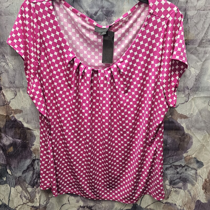 Short sleeve blouse in pink and white print.
