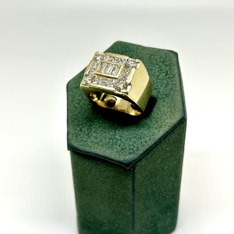 Gents diamond square ring crafted in 14k YG. Center has 3 emerald cut diamonds bezel set girdle to girdle with an approx. combined wt. of 0.70 ct. On all corners are 4 round brilliant diamonds with a combined wt. of approx. 1.33 ct. In between the round brilliants on all sides are 10 princess cut diamonds with approx. combined wt. of 1.0 ct. Diamonds have color of G/H, VS clarity. Total ring wt. 18.0 gms. Size 8.<br />
Shipping can be arranged at buyers expense.