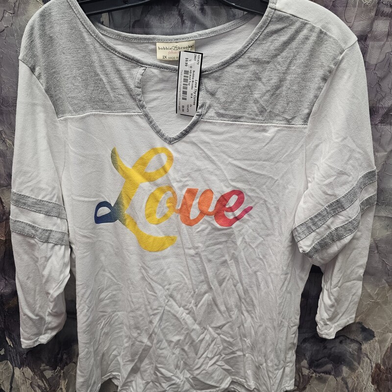 Half sleeve knit top in white with grey and rainbow love graphic