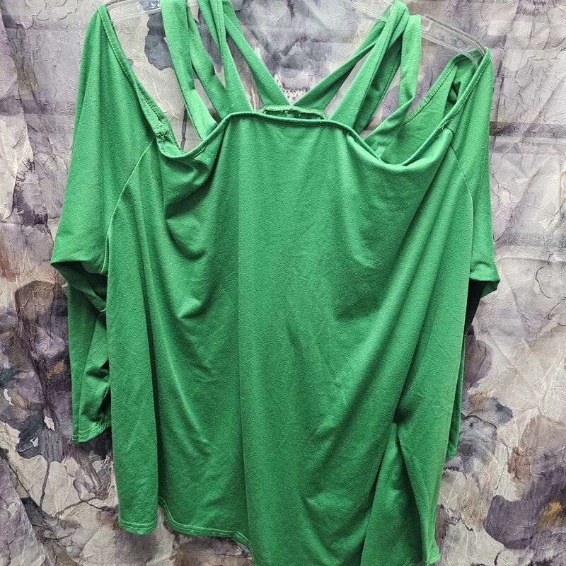 Long sleeve knit top in green with strappy cold shoulder style cut.