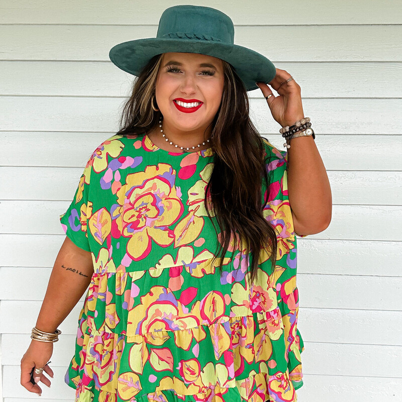 The CUTEST top for Spring or Summer! Universal enough to wear to a casual lunch, but cute enough to style and also wear to a dinner date!
The flow of this babydoll style tunic makes for a flattering and comfortable fit!
Available in Green and Sky Blue.
Madison is wearing a size 1X.