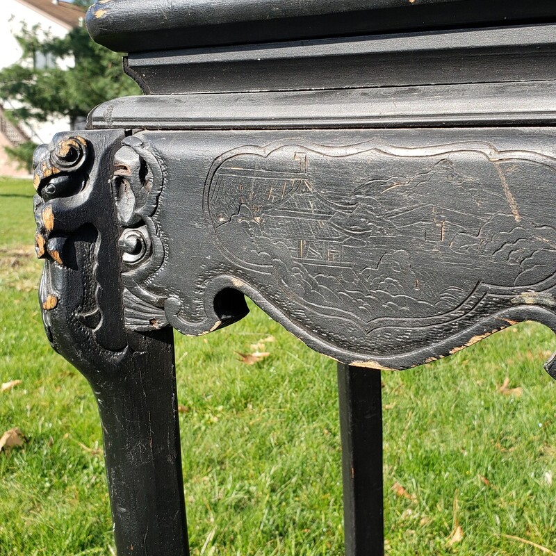 Vintage Elephant Side Table. Elephants carved into the corners with scene carved into side. Has wear and scratches. Size: 30T x 14W x 14D