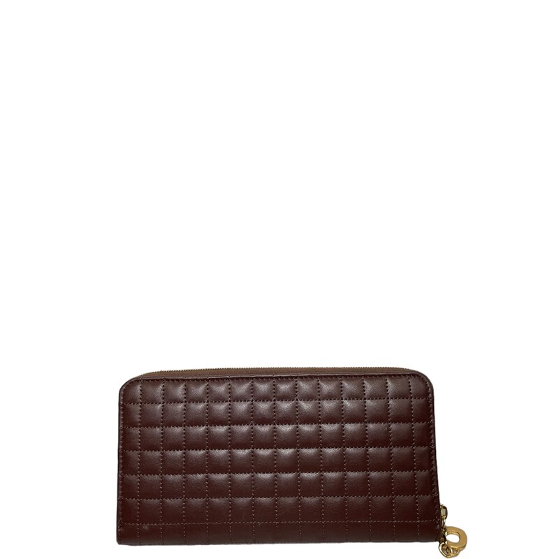 Celine  Continental Quilted Calfskin Large Wallet<br />
Brown Leather<br />
Gold-Tone Hardware<br />
Leather Lining with 2 compartments, 12 credit card slots, 1 zipped pocket and 1 flat pocket<br />
Exposed Zip Closure<br />
Dimensions:<br />
Height: 4<br />
Width: 7.5<br />
Depth: 0.75