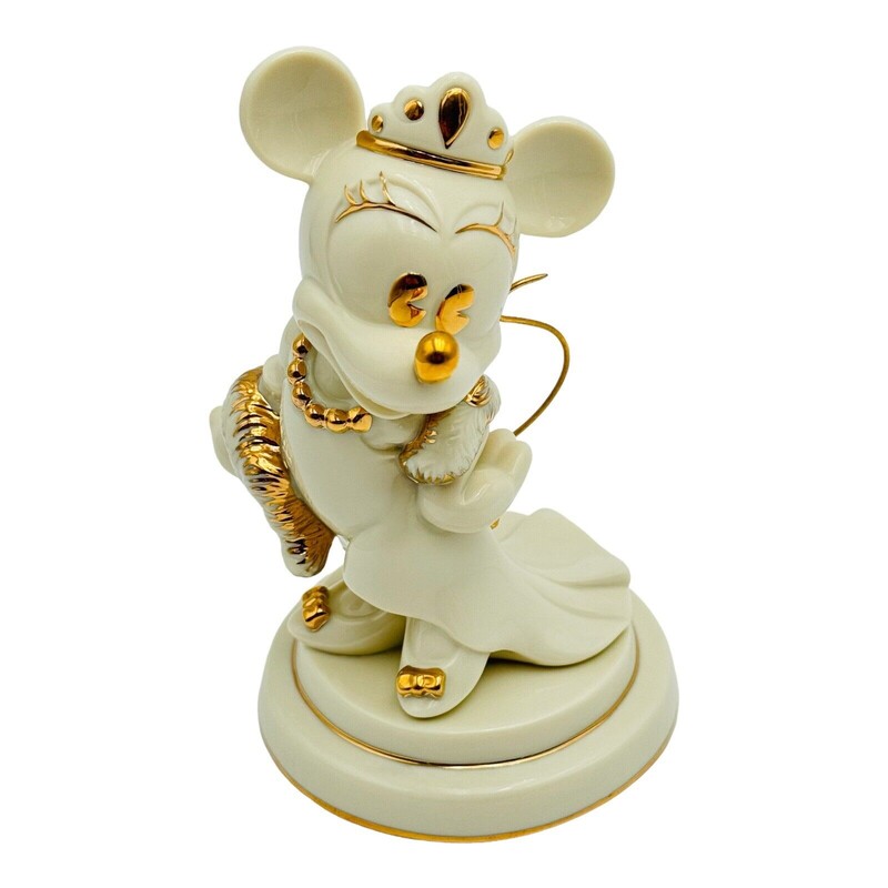 Lenox Minnie Mouse's Elegant Evening Figurine
Cream Gold Size: 4.5 x 5.5H
Disney Showcase Collection